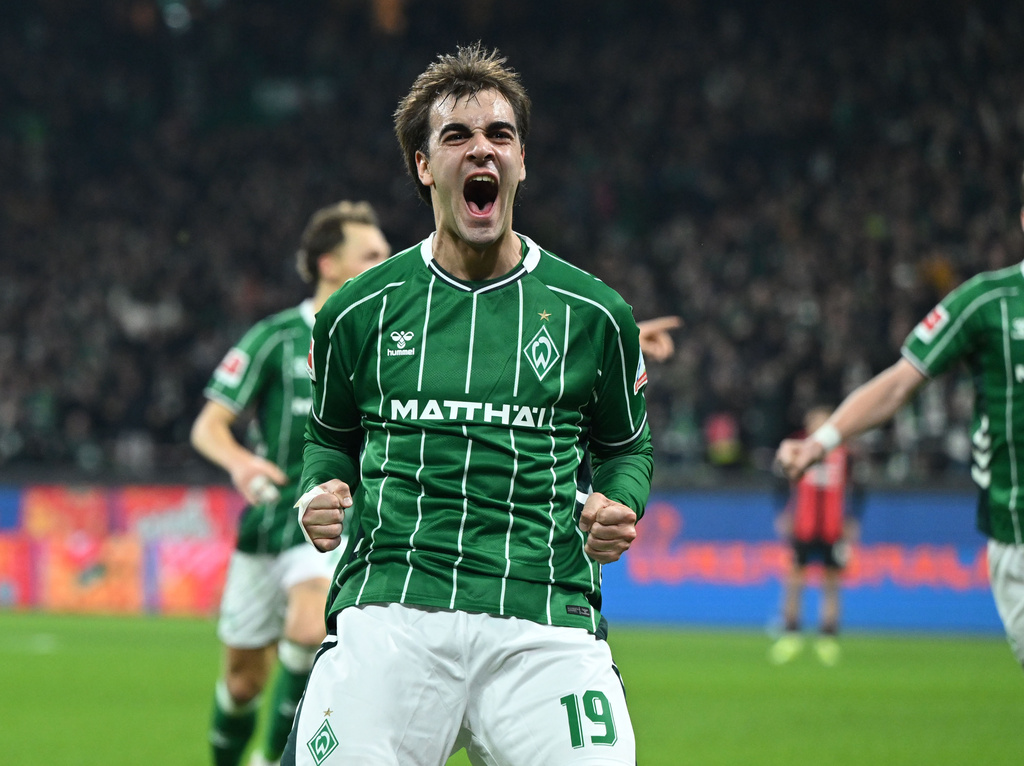 Werder Bremen's Jovan Miosevic celebrates after scoring his side's third goal during the German Bundesliga soccer match between Werder Bremen and Eintracht Frankfurt, in Bremen, Germany, Friday, Jan. 16, 2026. (dpa via AP)