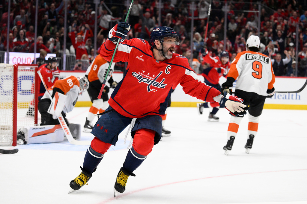 Washington Capitals left wing Alex Ovechkin (8) celebrates his goal during the first period of an NHL hockey game against the Philadelphia Flyers, Tuesday, March 31, 2026, in Washington. (AP Photo/Nick Wass)