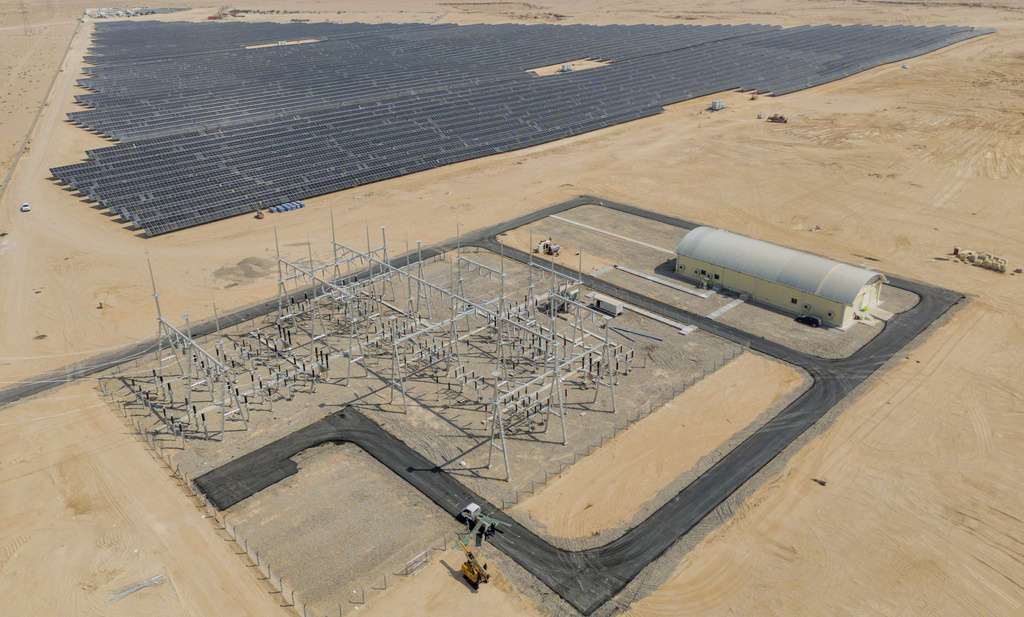 This aerial photo shows panels at a newly opened industrial-scale solar power plant in Karbala, Iraq, Wednesday, Sept. 17, 2025. (AP Photo/Anmar Khalil)