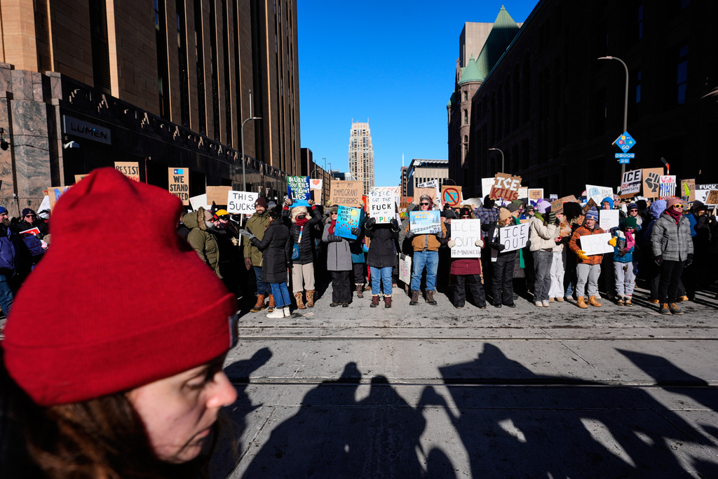 EDS NOTE: OBSCENITY - People gather during a protest Friday, Jan. 30, 2026, in Minneapolis. (AP Photo/Alex Brandon)