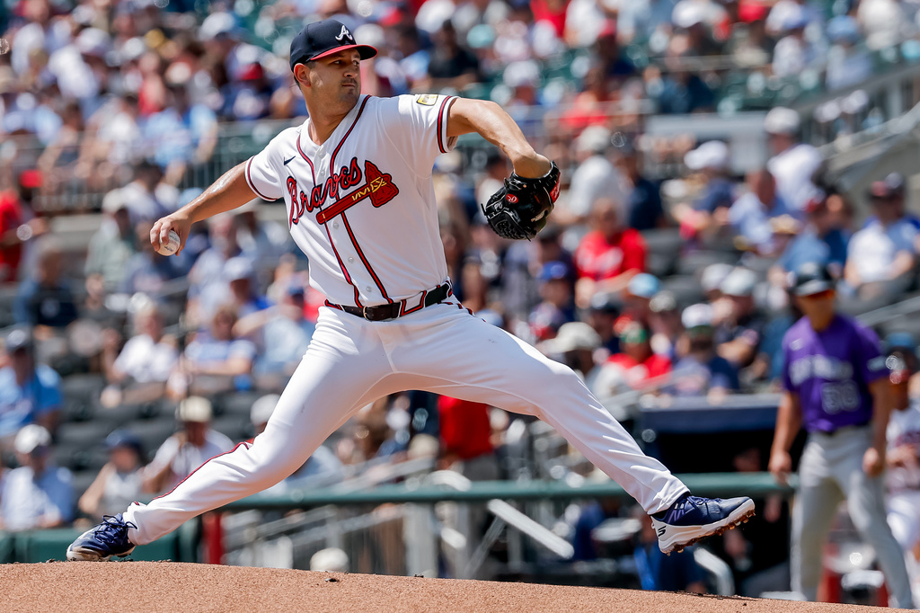 Atlanta Braves pitcher Tyler Mahle delivers to a Colorado Rockies batter during the first inning of a baseball game, Sunday, Aug. 30, 2026, in Atlanta. (AP Photo/Erik S. Lesser)