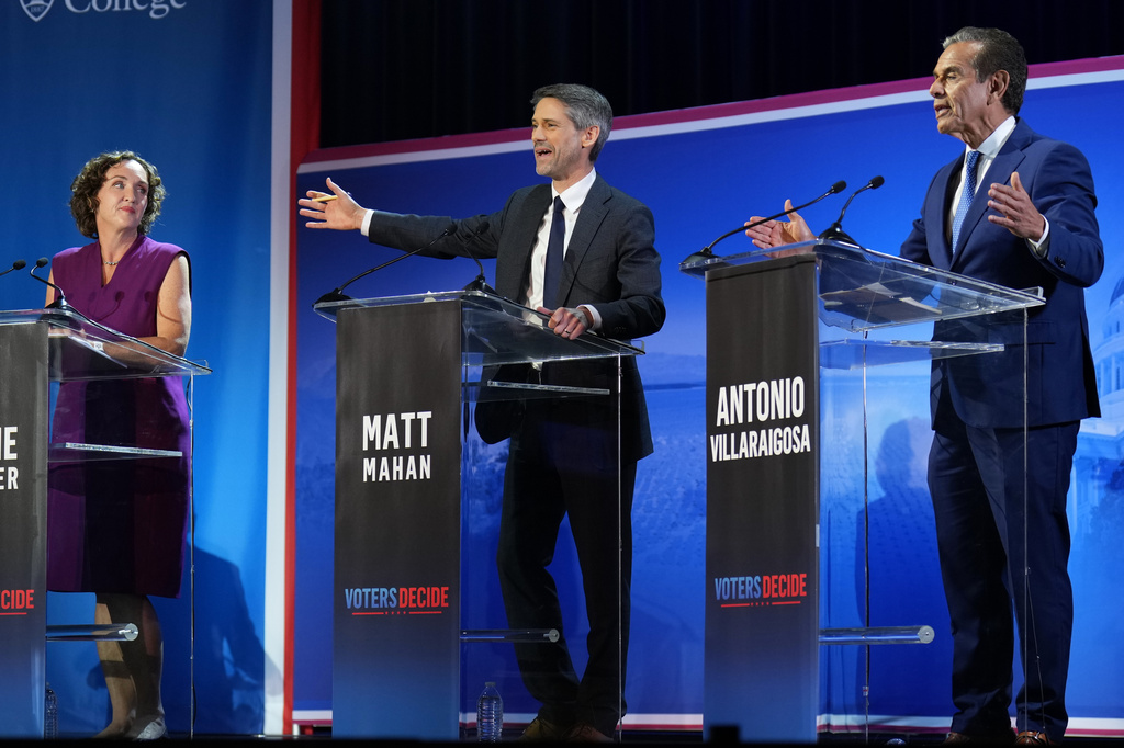 Antonio Villaraigosa, right, and Matt Mahan speak during a California gubernatorial debate hosted by CBS LA at Pomona College in Claremont, Calif., Tuesday, April 28, 2026. (AP Photo/Jae C. Hong)