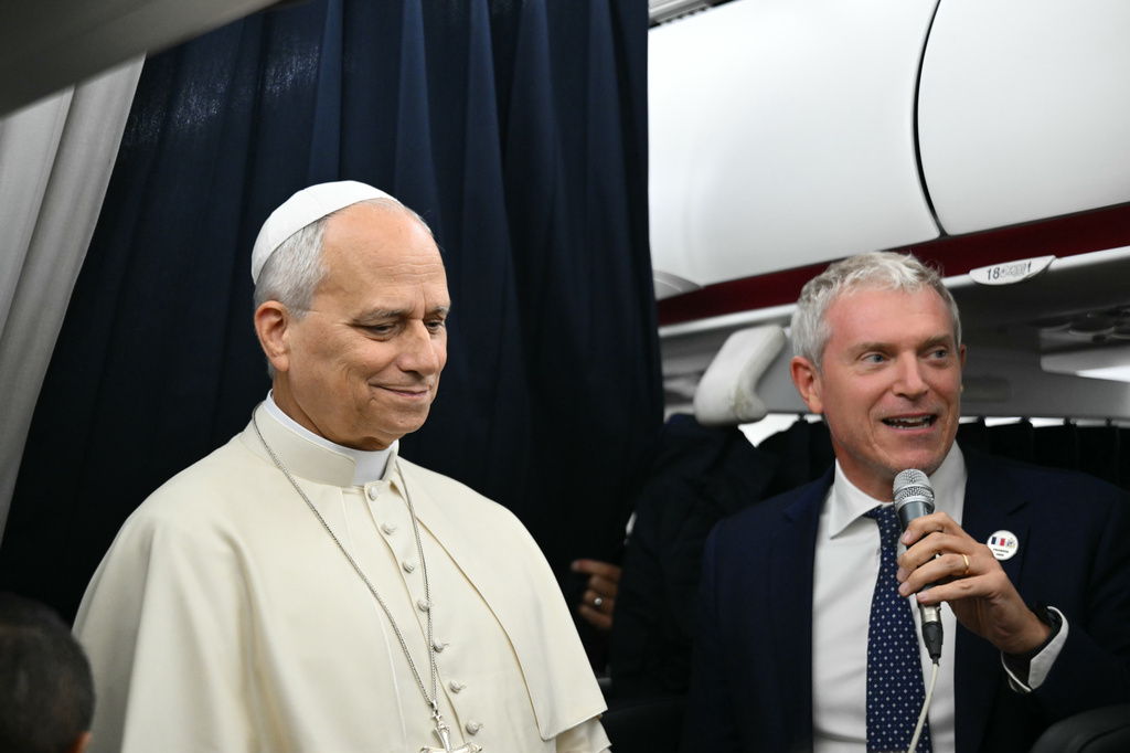 Pope Leo XIV speaks to journalists aboard the flight from Metz, France, to Rome, at the end of his four-day visit to France, Monday, Sept. 28, 2026. (Alberto Pizzoli/Pool Photo via AP)
