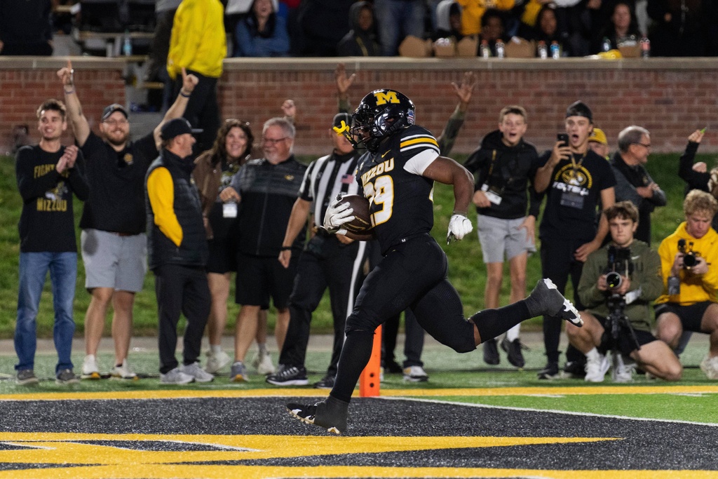 Missouri running back Ahmad Hardy scores a touchdown during the second half of an NCAA college football game against the Mississippi State Saturday, Nov. 15, 2025, in Columbia, Mo. Missouri won 49-27. (AP Photo/L.G. Patterson)