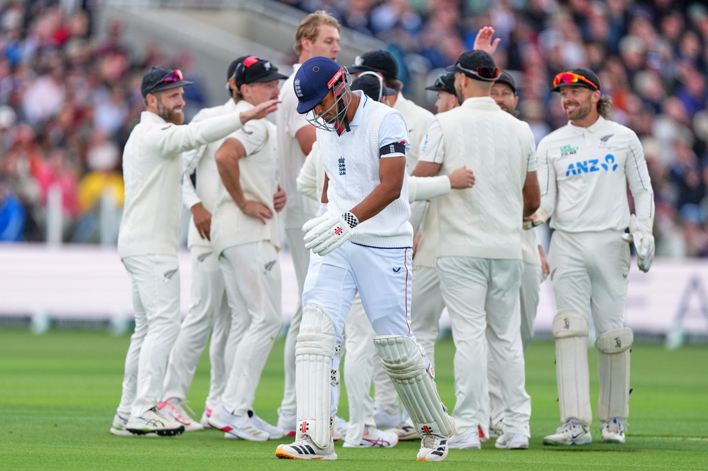 England's Emilio Gay leaves the pitch after he is caught off a ball bowled by New Zealand's Kyle Jamieson during the first day of their test match at Lord's cricket ground in London, Thursday, June 4, 2026. (AP Photo/Kirsty Wigglesworth)