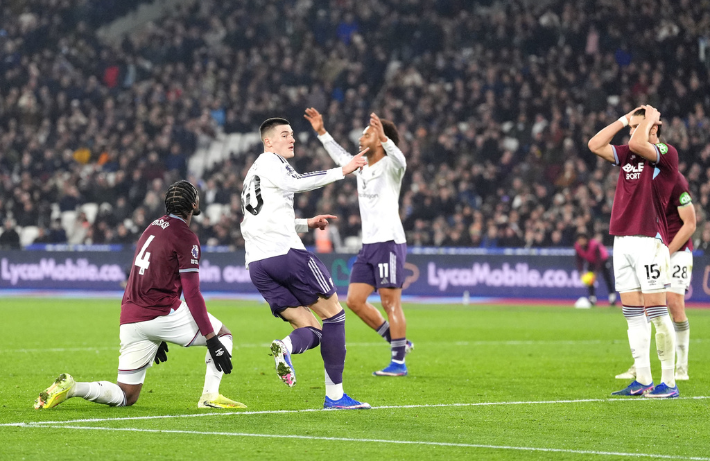 Manchester United's Benjamin Sesko (30) reacts after scoring against West Ham United during a Premier League soccer match, Tuesday, Feb. 10, 2026, in London. (Adam Davy/PA via AP)