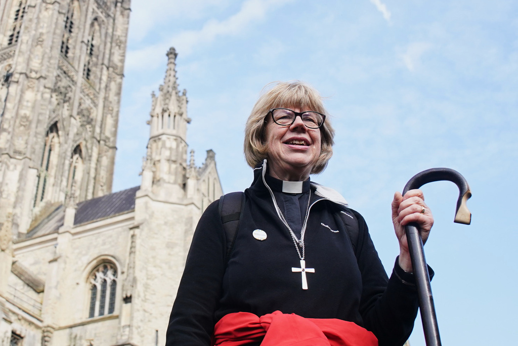 The Archbishop of Canterbury Dame Sarah Mullally poses for a photo after an 87-mile pilgrimage from London to Canterbury Cathedral, in Canterbury, England, Sunday, March 22, 2026. (Gareth Fuller/PA via AP)