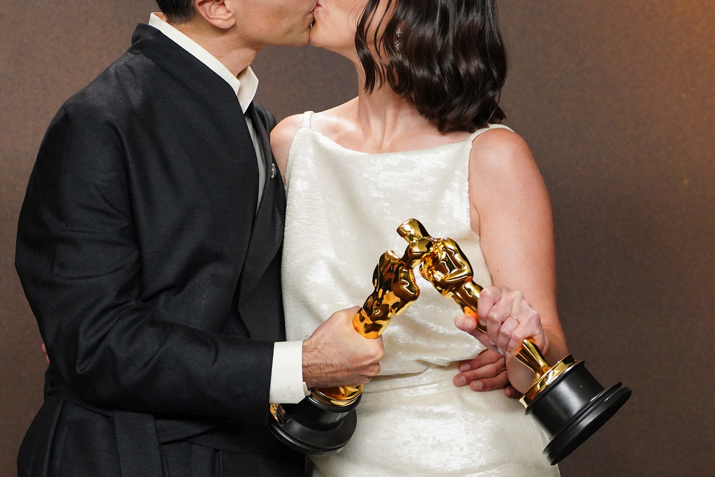 Alexandre Singh, left, and Natalie Musteata, winners of the award for live action short film for "Two People Exchanging Saliva," pose in the press room at the Oscars on Sunday, March 15, 2026, at the Dolby Theatre in Los Angeles. (Photo by Jordan Strauss/Invision/AP)