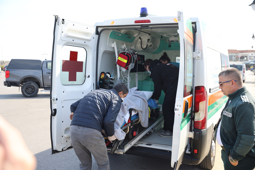 Bulgarian authorities take an injured crew member to a hospital after two commercial vessels were attacked in the NATO member's Black Sea economic zone on Tuesday, Oct. 6, 2026, Varna, in what was the first such attack on shipping in the area. (Bulgarian News Agency via AP)