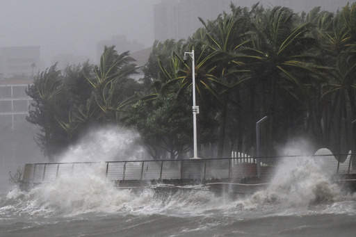 In this photo released by Xinhua News Agency, strong waves are seen ahead of Typhoon Matmo near the coastal downtown area of Haikou, in southern China's Hainan Province on Sunday, Oct. 5, 2025. (Guo Cheng/Xinhua via AP) In this photo released by Xinhua News Agency, strong waves are seen ahead of Typhoon Matmo near the coastal downtown area of Haikou, in southern China's Hainan Province on Sunday, Oct. 5, 2025. (Guo Cheng/Xinhua via AP)