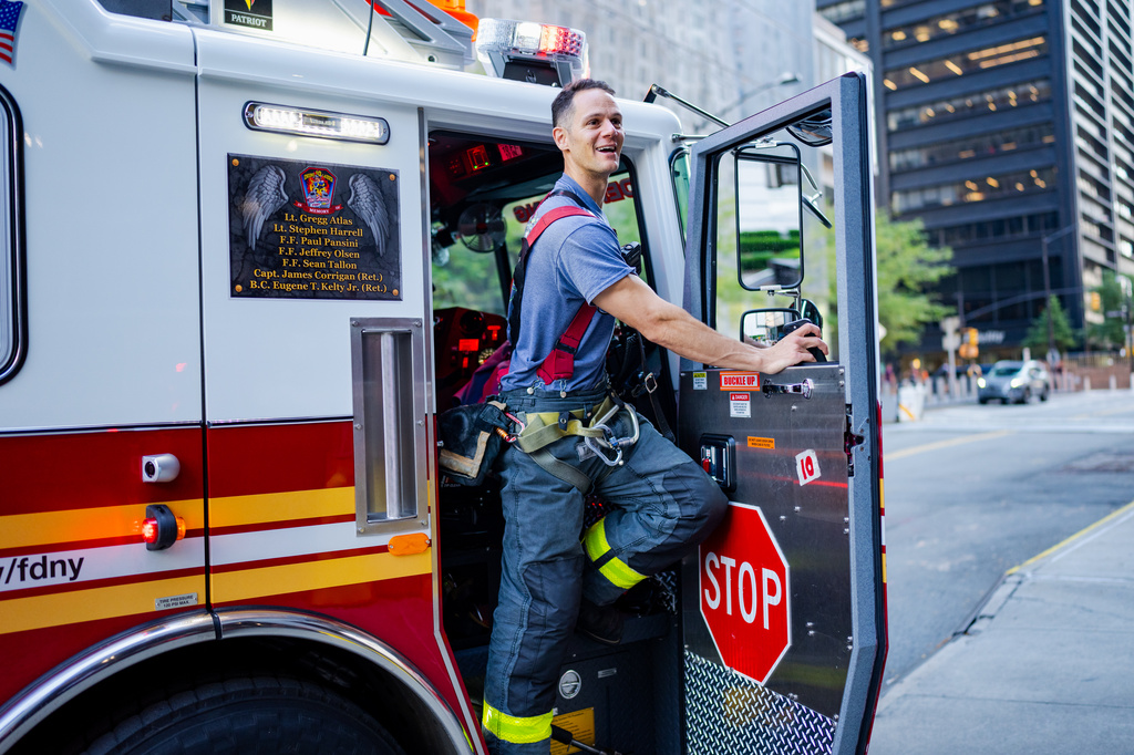 Lt. Anthony Giannone of Ladder 10 FDNY work near Ground Zero, 25 years after the Sept. 11, 2001, attacks, on Friday, Aug. 7, 2026 in New York. (AP Photo/Angelina Katsanis)
