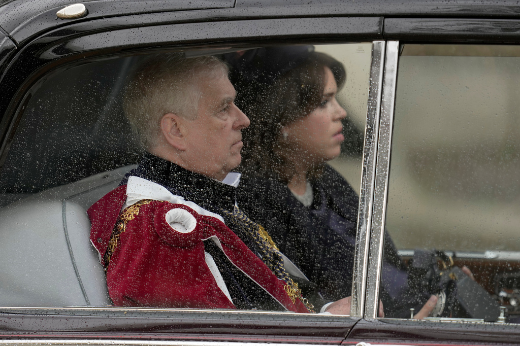 FILE - Britain's Prince Andrew and Princess Eugenie arrive ahead of the coronation of King Charles III and Camilla, the Queen Consort, in London, May 6, 2023. (AP Photo/Kin Cheung, File)