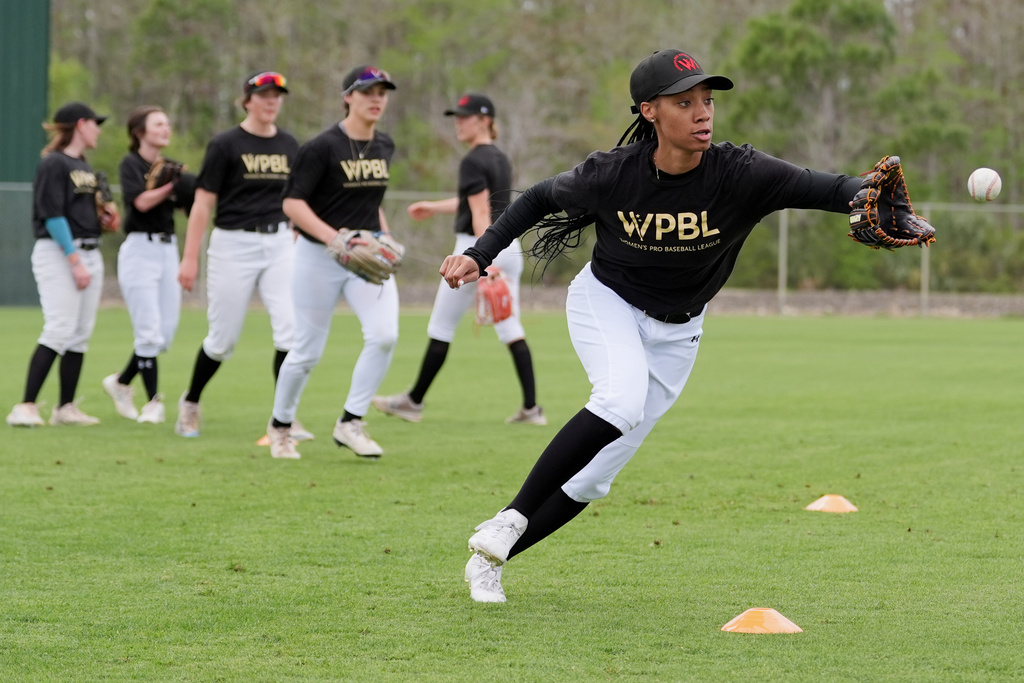 Mo'ne Davis fields a ball during a Women's Pro Baseball League (WPBL) practice, Wednesday, March 18, 2026, in Fort Myers, Fla. (AP Photo/Rebecca Blackwell)