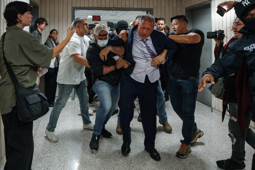 FILE - New York City Comptroller Brad Lander is arrested by Immigration and Customs Enforcement and FBI agents outside federal immigration court, June 17, 2025, in New York. (AP Photo/Olga Fedorova, File)
