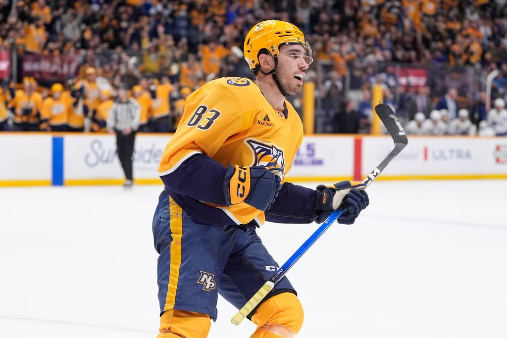Nashville Predators defenseman Adam Wilsby (83) celebrates his goal during the second period of an NHL hockey game against the Toronto Maple Leafs, Saturday, Dec. 20, 2025, in Nashville, Tenn. (AP Photo/George Walker IV)