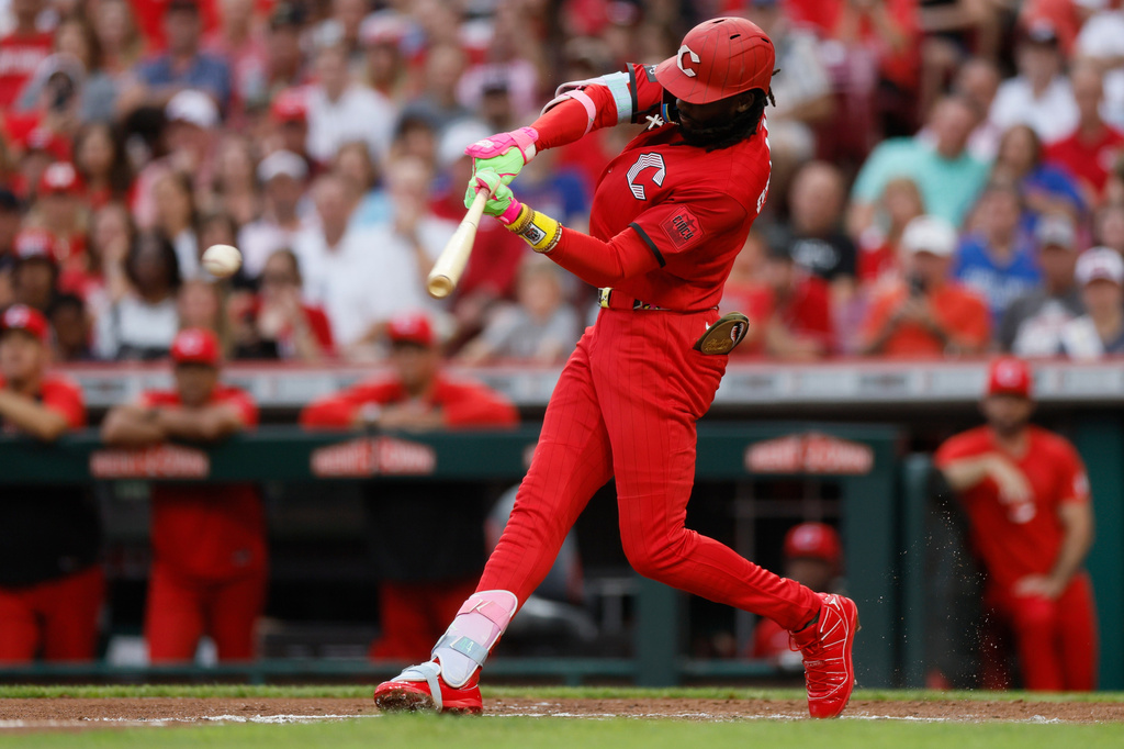 Cincinnati Reds' Jose De La Cruz singles against the Chicago Cubs during the third inning of a baseball game, Saturday, July 11, 2026, in Cincinnati. (AP Photo/Jay LaPrete)