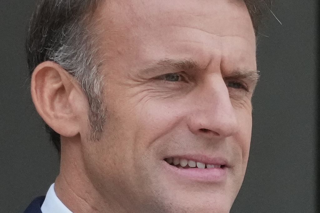 French President Emmanuel Macron waits for Jordan's Crown Prince Hussein at the presidential Elysee Palace, Wednesday, Oct. 8, 2025 in Paris. (AP Photo/Michel Euler)