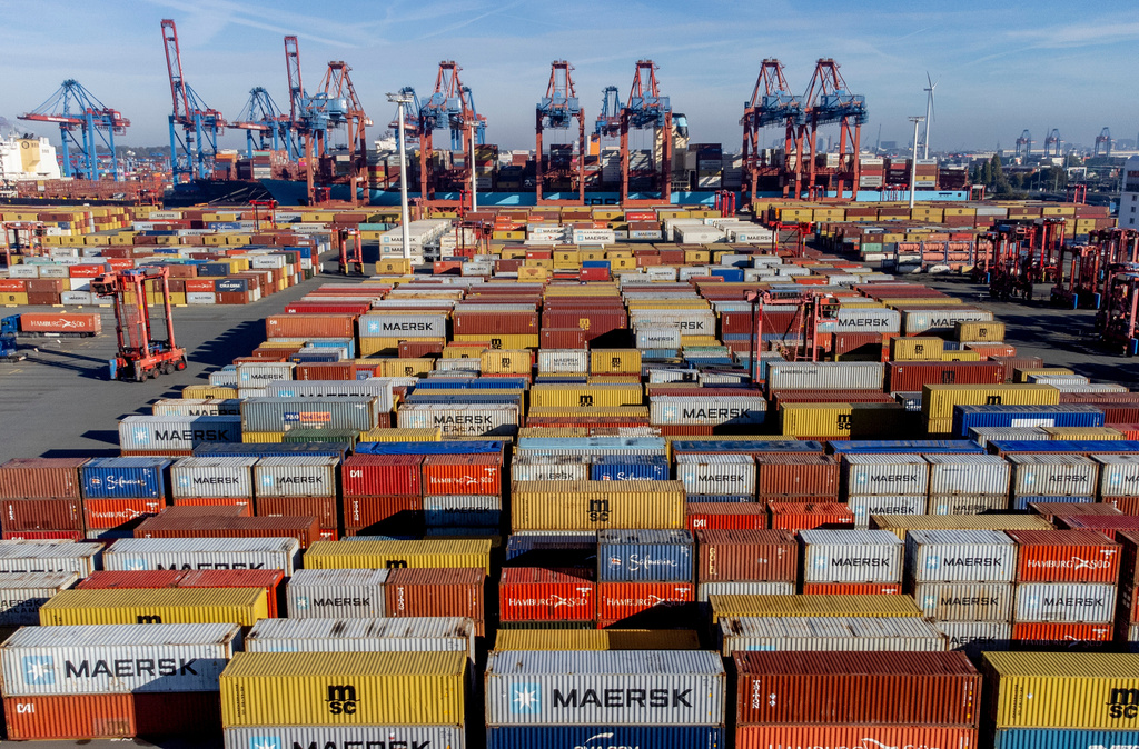FILE - Containers are piled up in the harbor in Hamburg, Germany, on Oct. 26, 2022. (AP Photo/Michael Probst, file)