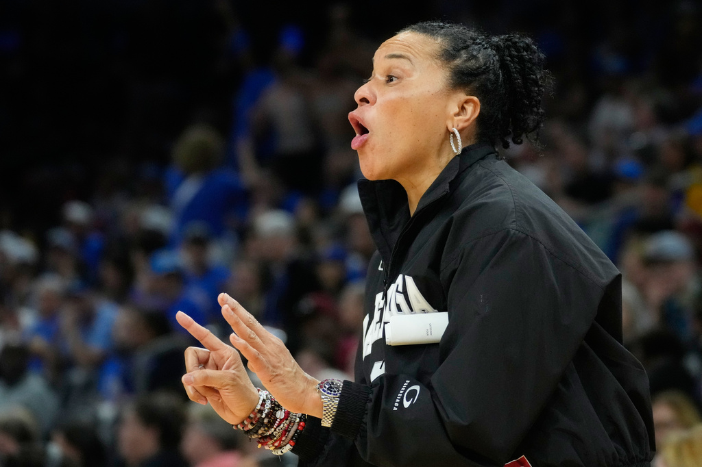 FILE - South Carolina head coach Dawn Staley motions towards the court against UCLA during the second half of the women's National Championship Final Four NCAA college basketball tournament game, April 5, 2026, in Phoenix. (AP Photo/Ross D. Franklin, File)