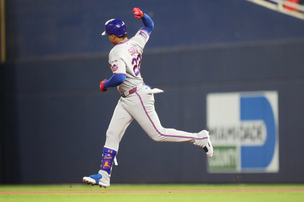 New York Mets' Juan Soto runs the bases after hitting a solo home run during the first inning of a baseball game against the Miami Marlins, Friday, May 22, 2026, in Miami. (AP Photo/Lynne Sladky)
