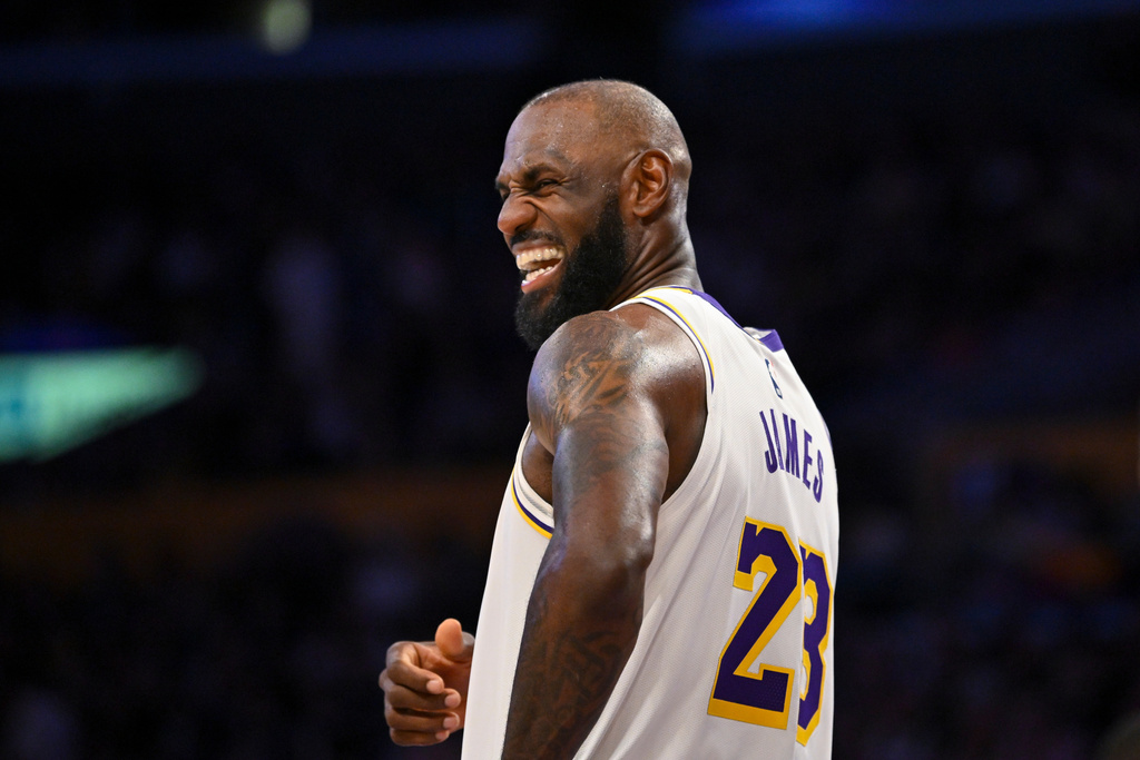 Los Angeles Lakers forward LeBron James smiles during the first half of an NBA basketball game against the Boston Celtics, Sunday, Feb. 22, 2026, in Los Angeles. (AP Photo/Katie Chin)