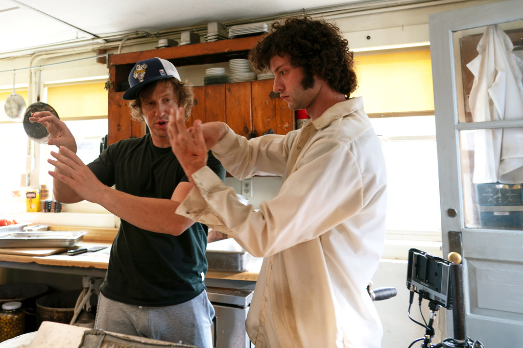 This image released by A24 shows director Matt Johnson, left, with actor Dominic Sessa on the set of "Tony." (A24 via AP)
