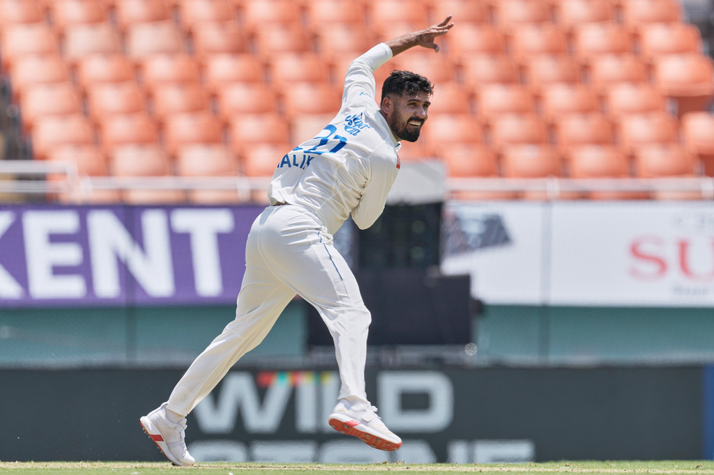 Afghanistan's Abdul Malik bowls a delivery on day one of the cricket test match between Afghanistan and India in New Chandigarh, India, Saturday, June 6, 2026. (AP Photo/Ashwini Bhatia)