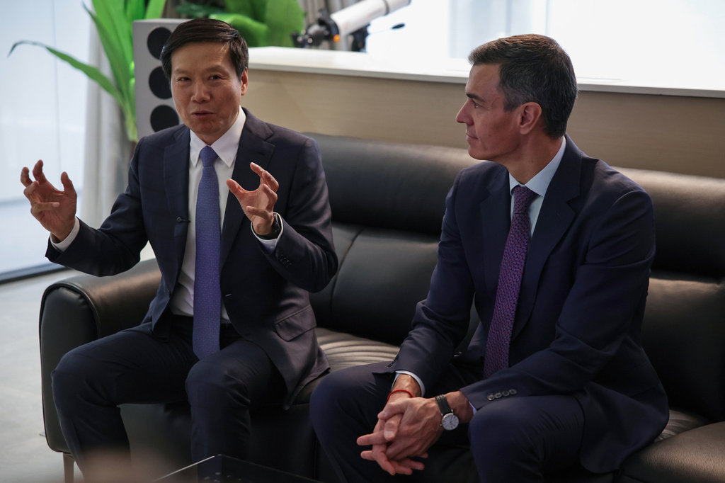 Xiaomi founder Lei Jun, left, and Spanish Prime Minister Pedro Sanchez meet at the Xiaomi headquarters in Beijing, Monday, April 13, 2026. (Andres Martinez Casares/Pool Photo via AP)