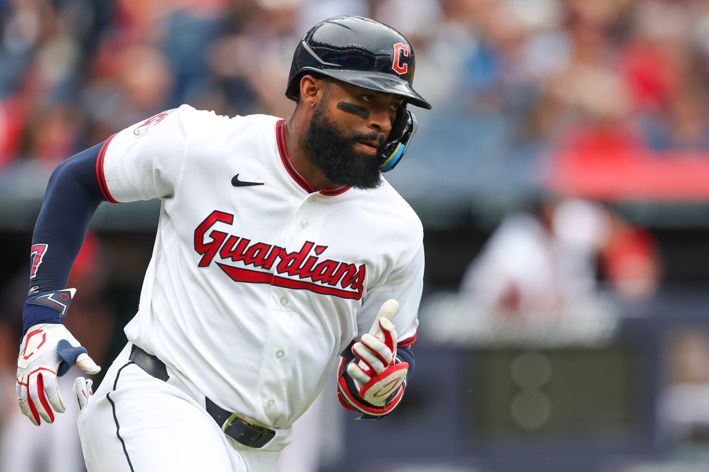 Cleveland Guardians' Jo Adell runs after hitting a two-run double against the Kansas City Royals in the third inning of a baseball game in Cleveland, Sunday, Aug. 30, 2026. (AP Photo/Tim Phillis)