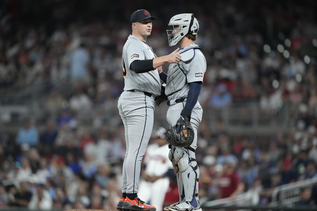 Detroit Tigers pitcher Tarik Skubal (29) talks to catcher Dillon Dingler (13) during the seventh inning of a baseball game against the Atlanta Braves Wednesday, Apr. 29, 2026, in Atlanta. (AP Photo/Brynn Anderson)