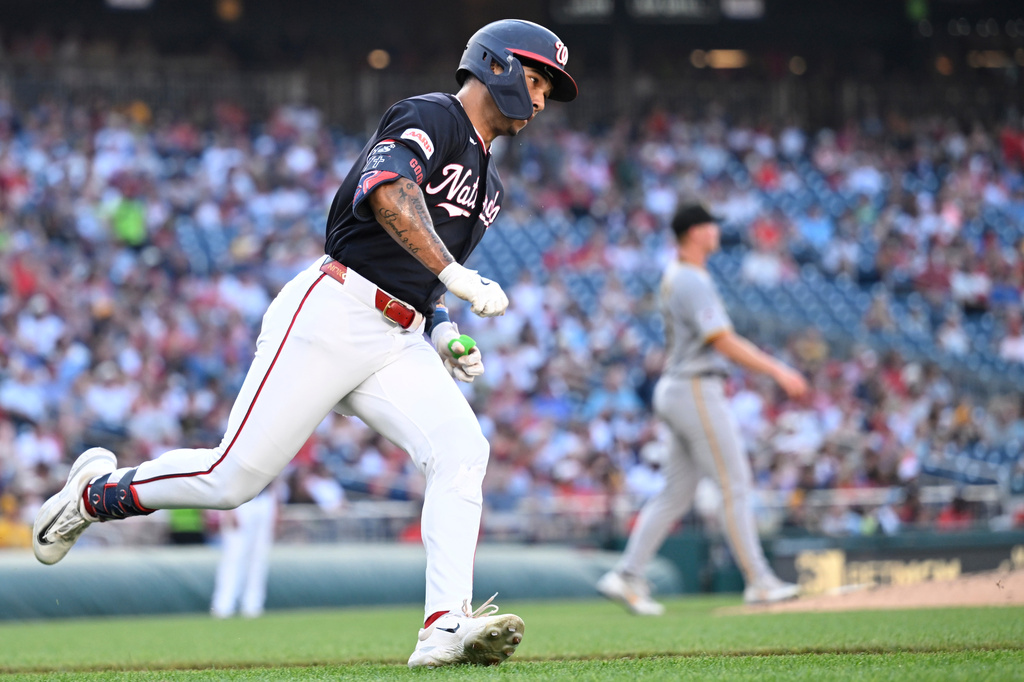 Washington Nationals' Daylen Lile runs the bases after hitting a solo home run during the second inning of a baseball game against the Pittsburgh Pirates, Friday, July 3, 2026, in Washington. (AP Photo/John McDonnell)