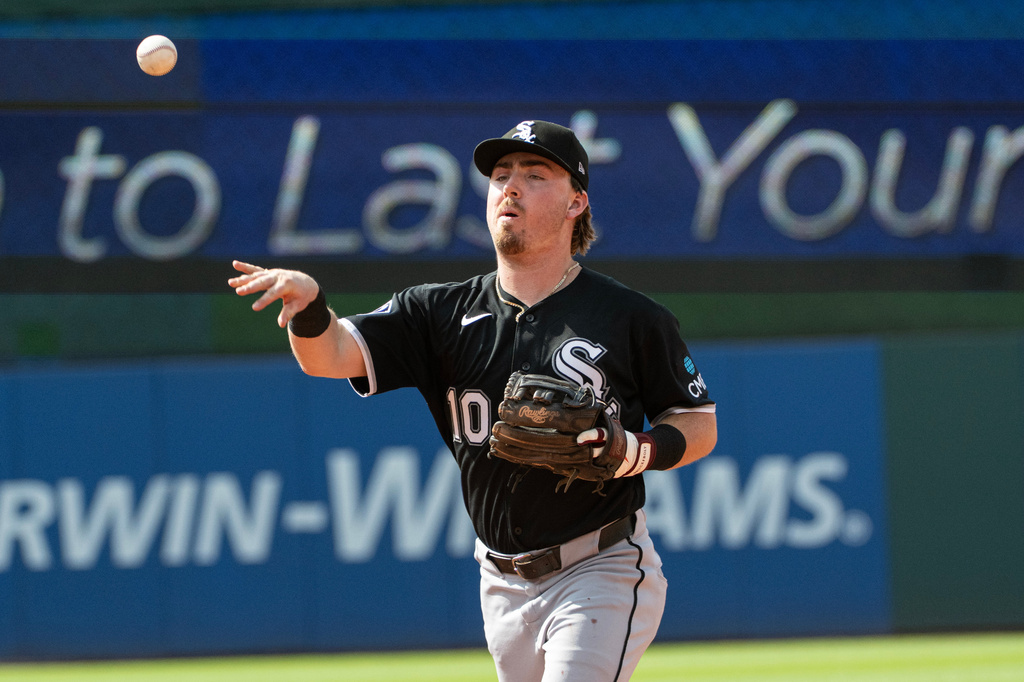 Chicago White Sox's Chase Meidroth throws out Cleveland Guardians' Travis Bazzana during the fourth inning of a baseball game, Sunday, July 5, 2026, in Cleveland. (AP Photo/Phil Long)