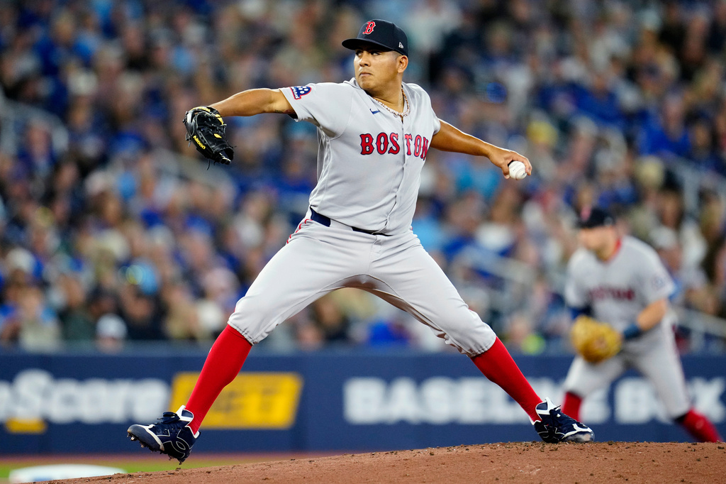 Boston Red Sox pitcher Ranger Suarez works against the Toronto Blue Jays during first-inning baseball game action in Toronto, Monday, April 27, 2026. (Frank Gunn/The Canadian Press via AP)