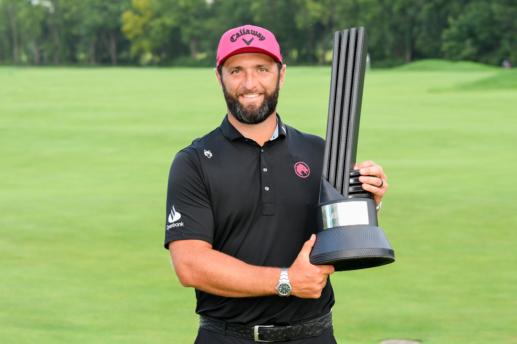 LIV Golf season-long champion captain Jon Rahm, of Legion XIII, poses with the trophy after the final round of LIV Golf Indianapolis, Sunday, Aug. 23, 2026, in Westfield, Ind. (Montana Pritchard/LIV Golf via AP)