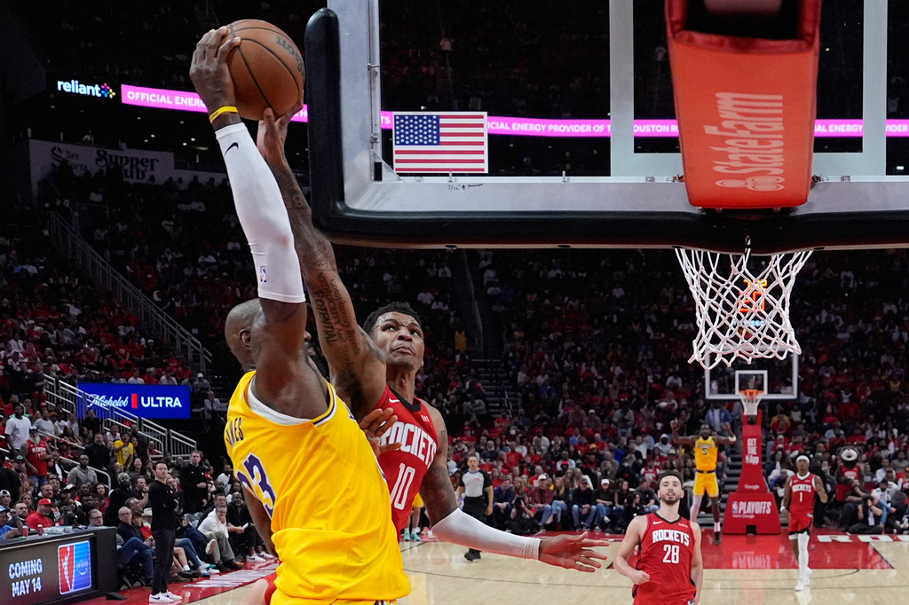 Houston Rockets forward Jabari Smith Jr. (10) blocks a shot by Los Angeles Lakers forward LeBron James (23) during the second half of Game 6 of a first-round NBA playoffs basketball series in Houston, Friday, May 1, 2026. (AP Photo/Ashley Landis)