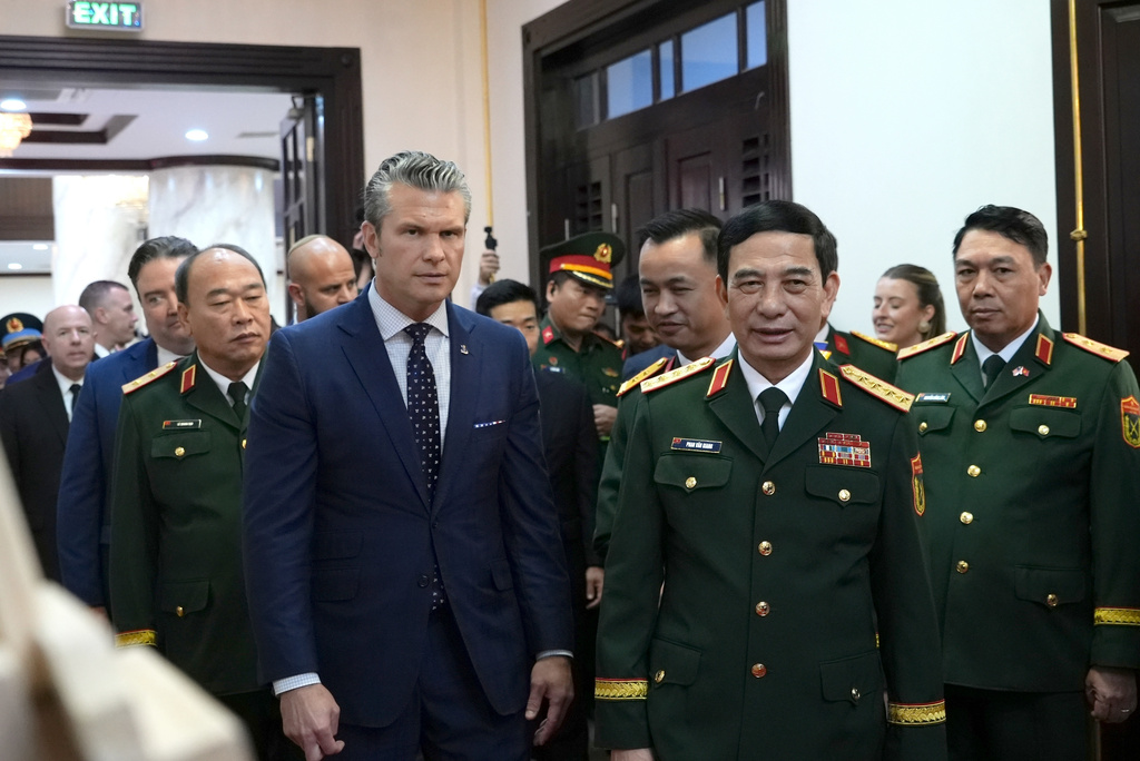 U.S. Defense Secretary Pete Hegseth and Vietnamese Defense Minister Phan Van Giang walk to a meeting in Hanoi, Vietnam, Sunday, Nov. 2, 2025. (AP Photo/Hau Dinh)