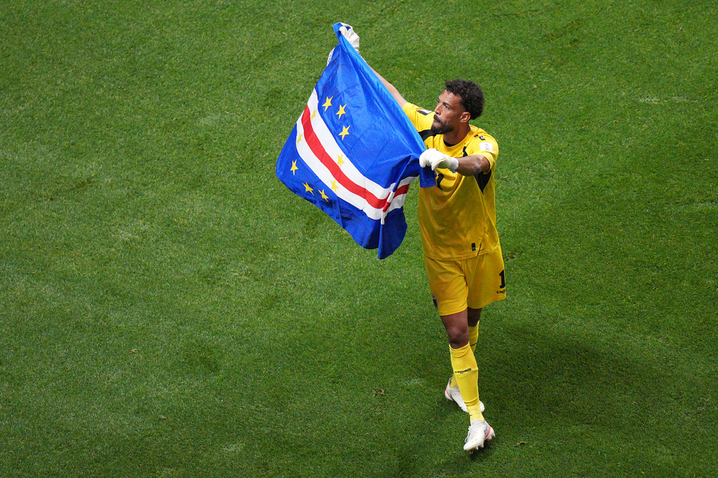 Cape Verde goalkeeper Vozinha (1) waves a flag for fans after a 0-0 draw during the World Cup Group H soccer match between Spain and Cape Verde in Atlanta, Monday, June 15, 2026. (AP Photo/Jacob Kupferman)