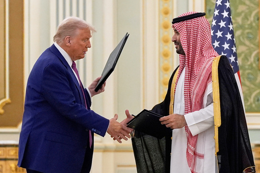 FILE - President Donald Trump and Saudi Crown Prince Mohammed bin Salman shake hands after exchanging documents during a signing ceremony at the Royal Palace in Riyadh, Saudi Arabia, May 13, 2025. (AP Photo/Alex Brandon, File) FILE - President Donald Trump and Saudi Crown Prince Mohammed bin Salman shake hands after exchanging documents during a signing ceremony at the Royal Palace in Riyadh, Saudi Arabia, May 13, 2025. (AP Photo/Alex Brandon, File)