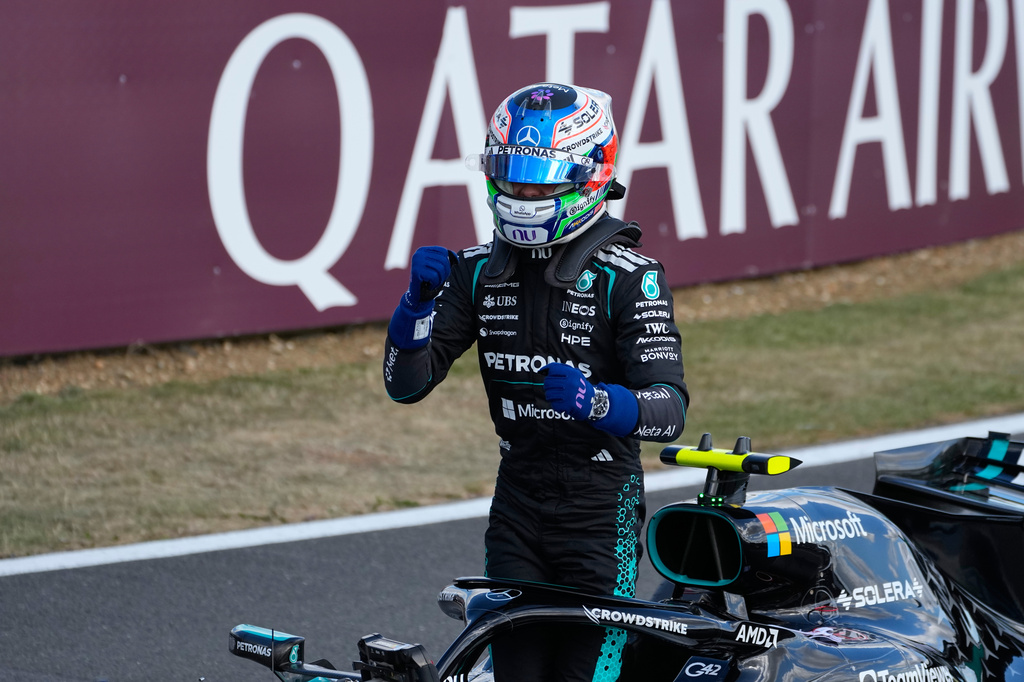 Mercedes driver Andrea Kimi Antonelli of Italy celebrates after clocked the fastest time during the qualifying session ahead of the British F1 Grand Prix, in Silverstone, England, Saturday, July 4, 2026. (AP Photo/Darko Bandic)