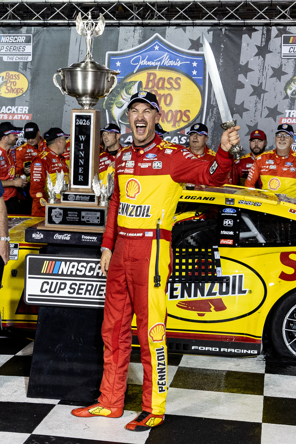 Joey Logano (22) celebrates after winning a NASCAR Cup Series auto race Saturday, Sept. 19, 2026, in Bristol, Tenn. (AP Photo/Wade Payne)