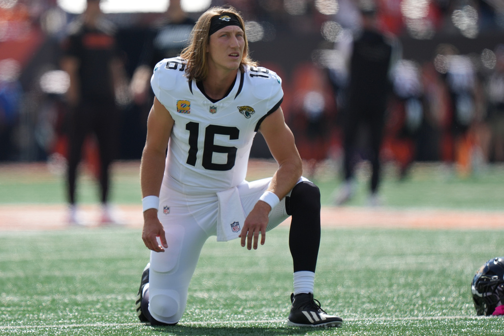 Jacksonville Jaguars quarterback Trevor Lawrence (16) warms up before an NFL football game against the Cincinnati Bengals in Cincinnati, Sunday, Oct. 4, 2026. (AP Photo/Joshua A. Bickel)