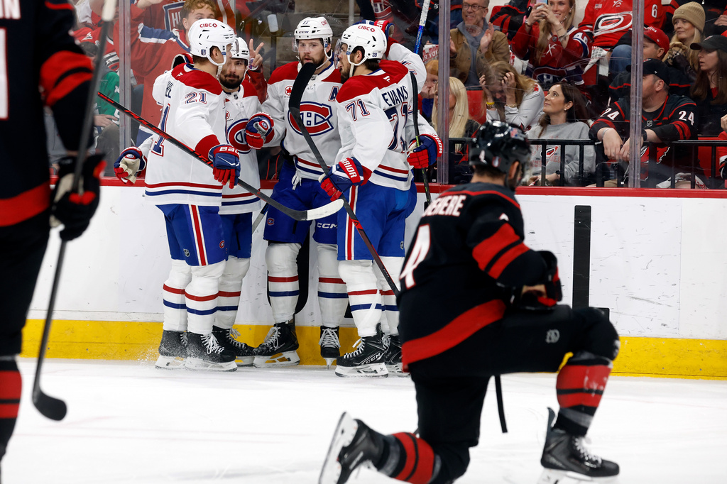 Montreal Canadiens celebrate a goal against the Carolina Hurricanes during the first period in Game 2 of the Eastern Conference finals NHL hockey Stanley Cup playoff series in Raleigh, N.C., Saturday, May 23, 2026. (AP Photo/Karl DeBlaker)
