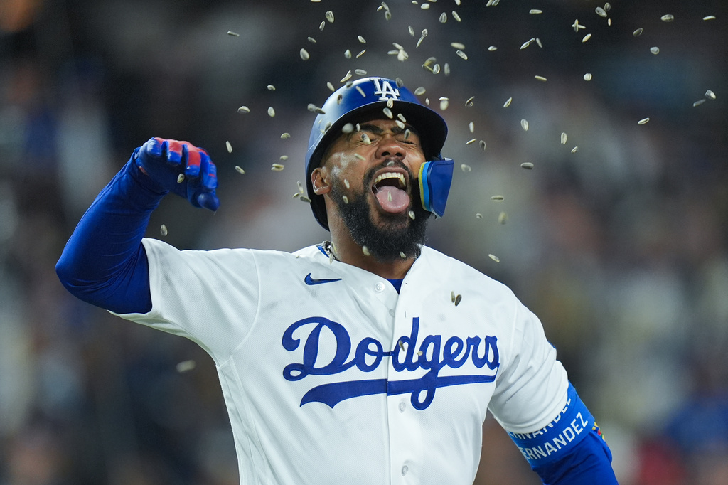 Los Angeles Dodgers' Teoscar Hernández celebrate his home run during the sixth inning of a baseball game against the New York Mets Wednesday, April 15, 2026, in Los Angeles. (AP Photo/Jae C. Hong)