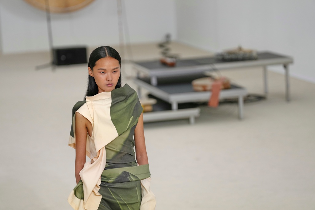 A model wears a creation as part of the Issey Miyake Spring/Summer 2026 collection presented in Paris, Friday, Oct. 3, 2025. (AP Photo/Aurelien Morissard)