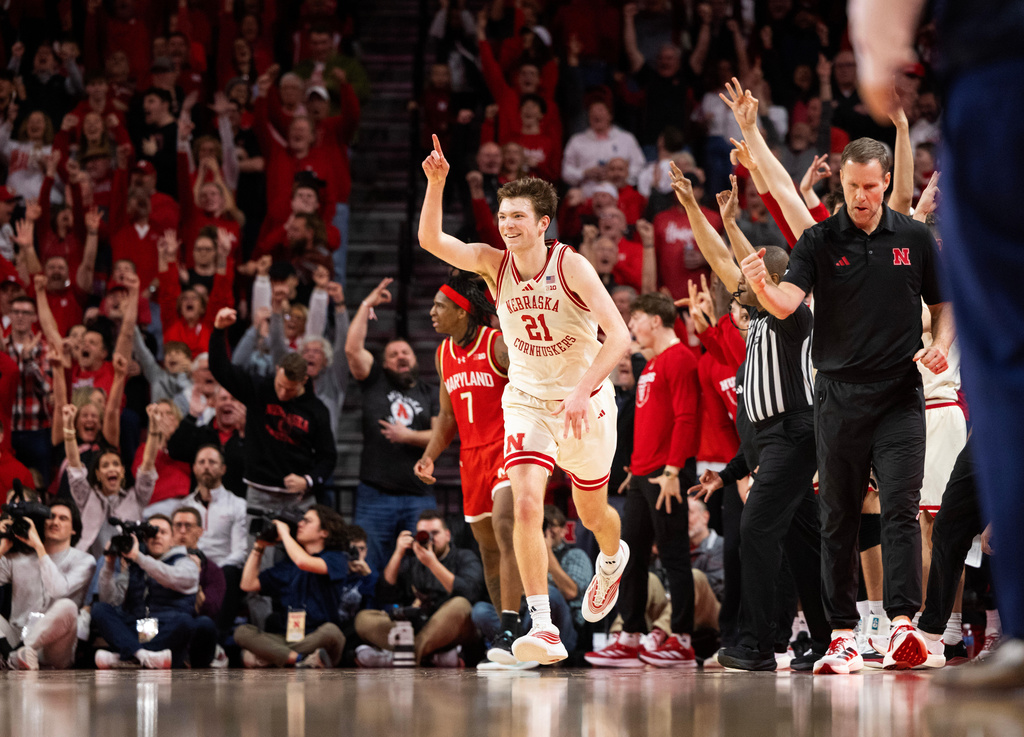 Nebraska's Pryce Sandfort (21) celebrates after making a three point shot against Maryland during the second half of an NCAA college basketball game Wednesday, Feb. 25, 2026, in Lincoln, Neb. (AP Photo/Rebecca S. Gratz)