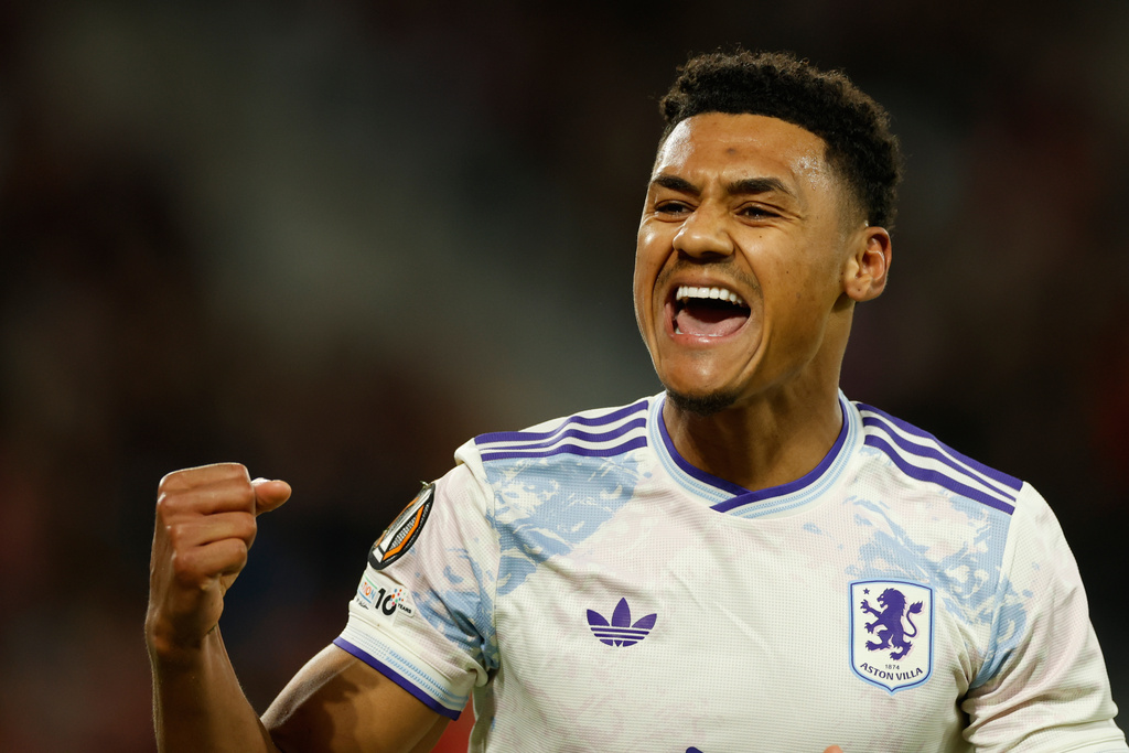 Aston Villa's Ollie Watkins celebrates after scoring during a first leg, round of 16 Europa League soccer match between Lille and Aston Villa in Lille, France, Sunday, Feb. 22, 2026. (AP Photo/Jean-Francois Badias)
