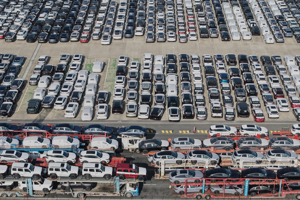 Aerial view of new cars waiting for shipment at a port in Shanghai, China, Wednesday, Jan. 14, 2026. (Chinatopix Via AP)