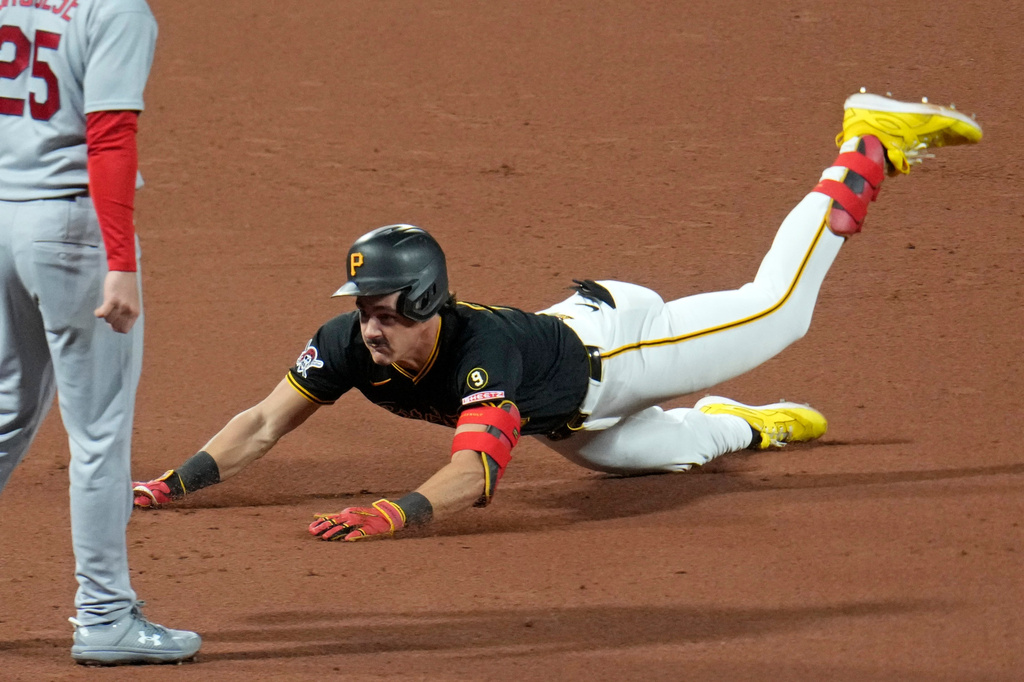 Pittsburgh Pirates' Konnor Griffin slides into third with a triple off St. Louis Cardinals pitcher Andre Pallante during the fifth inning of a baseball game in Pittsburgh, Tuesday, Sept. 22, 2026. (AP Photo/Gene J. Puskar)