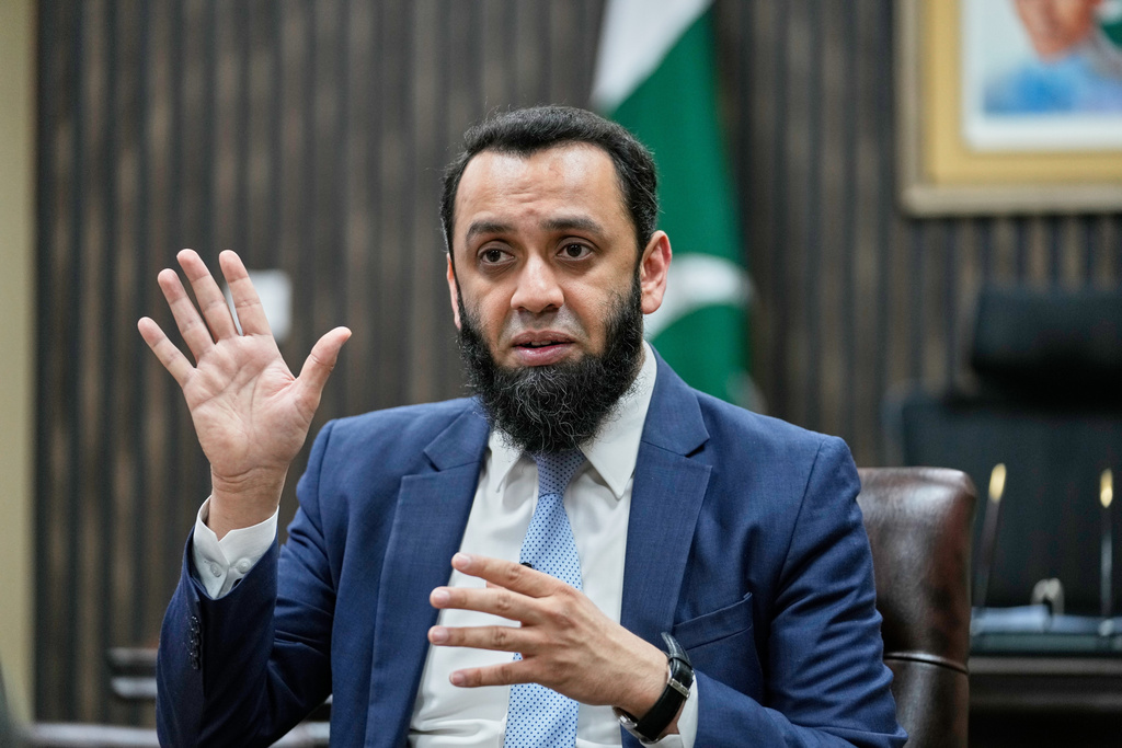 Pakistan's Information Minister Attaullah Tarar speaks during an interview with The Associated Press, in Islamabad, Wednesday, March 18, 2026. (AP Photo/Anjum Naveed)