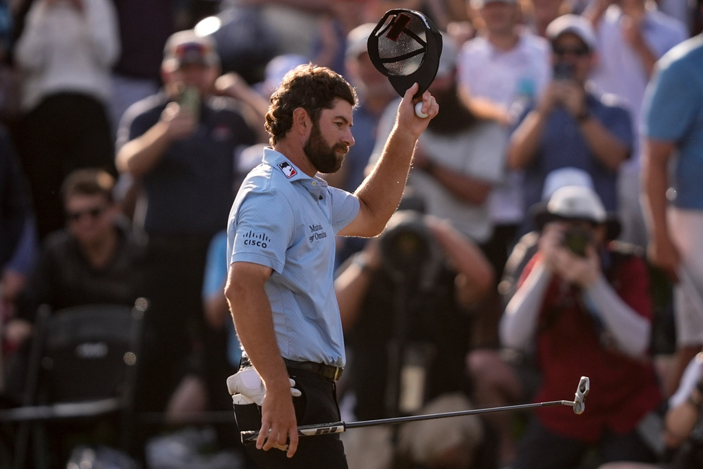 Cameron Young celebrates during the final round of The Players Championship golf tournament, Sunday, March 15, 2026, in Ponte Vedra Beach, Fla. (AP Photo/Gerald Herbert)